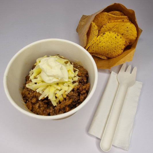 Beef Nachos, Grated Cheese, Sour Cream and Corn Chips